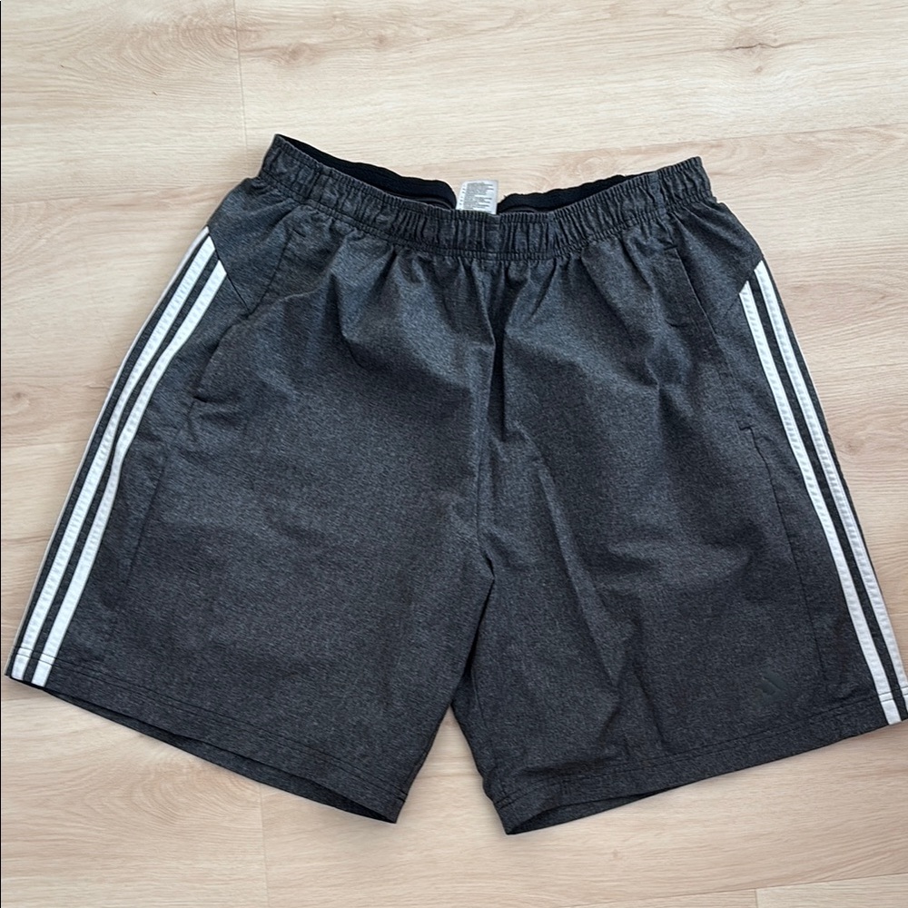 Adidas Gray Athletic Shorts with Signature Stripes